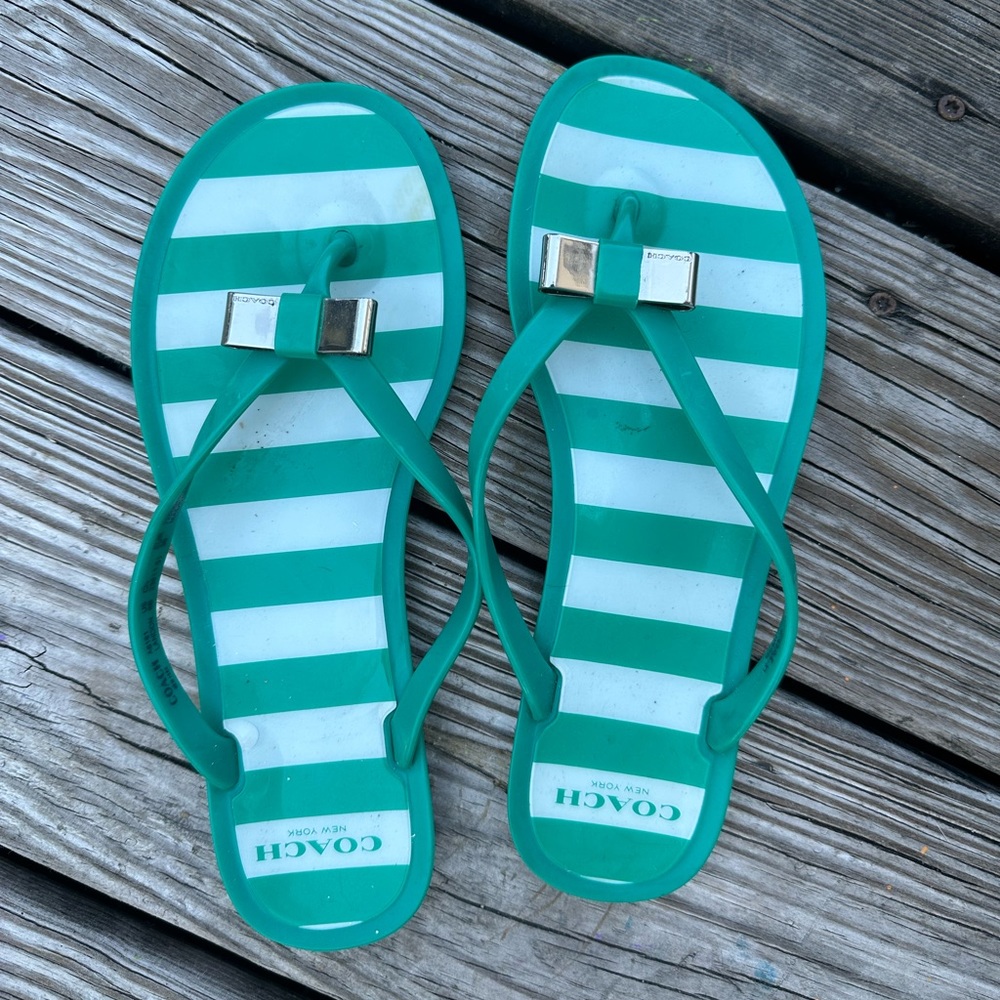 Coach, teal, flip flops with a bow.